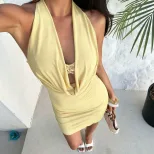 Backless Summer Dress with Metal Flower Detail Slim Fit Bodycon Style Perfect for Vacation