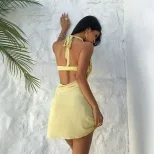 Backless Summer Dress with Metal Flower Detail Slim Fit Bodycon Style Perfect for Vacation