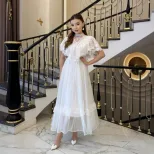 Elegant Vintage White Lace Panel Maxi Dress Lightweight Flowing Summer Style Perfect for Parties and Special Occasions